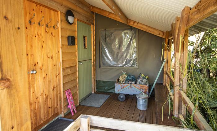 Veranda entrance porch for storing wood, coats and boots, a great place for sitting and having a morning coffee! Key safe box for storing the door key